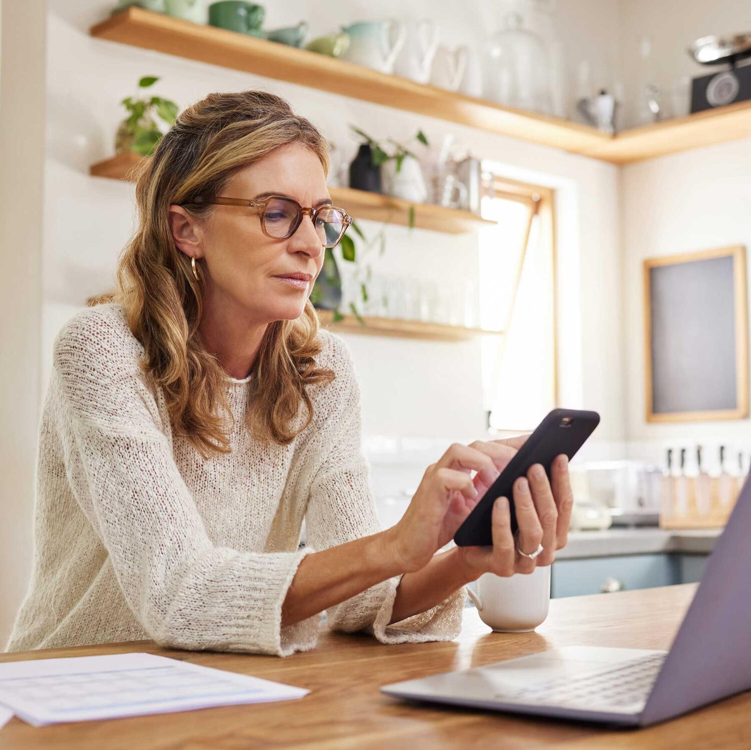 A woman planning a project on her phone